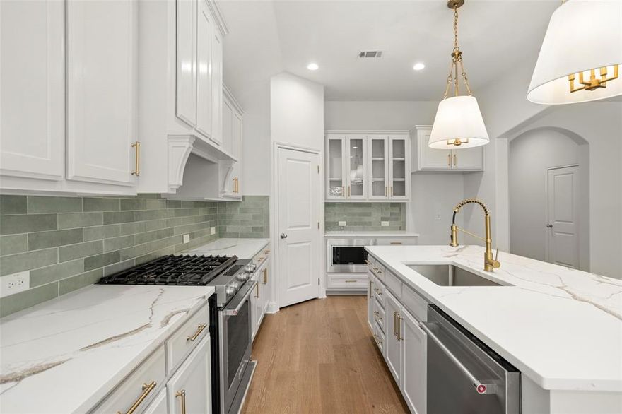 SELLER OFFERING $10,000 CONCESSIONS OR 2-1 INTEREST RATE BUY DOWN, SAVING 2% IN YEAR 1. YOU CHOOSE. Very motivated sellers, willing to consider all offers and potential additional incentives. Welcome to this beautifully updated 5-bedroom, 3.5-bathroom home in the highly sought-after Parks of Aledo community. Perfectly positioned on a premium lot backing to serene greenspace, this residence offers both tranquility and modern functionality. The 5th bedroom could flex as a 3rd living, office or complete multi-generational suite Step inside to discover a spacious, thoughtfully designed layout featuring an extra-large office—ideal for remote work or a home-based business or even a third living room for your guests—and a dedicated formal dining room perfect for entertaining. The remodeled interior boasts upgraded finishes, modern fixtures, and an open-concept flow filled with natural light. Downstairs, you’ll find a private en suite bedroom, ideal for guests or multi-generational living being just across from the office, which was previously a kitchen currently with plumbing access. Upstairs includes additional spacious bedrooms and flexible living space to suit a variety of needs. Enjoy the convenience of a 3-car tandem garage offering abundant storage and room for all your vehicles or hobbies. With 3 full bathrooms plus a guest half-bath, this home is designed for comfort and ease. Out back, relax or entertain on the patio while enjoying views of the peaceful greenspace beyond. Located in a vibrant, family-friendly community with parks, trails, and top-rated schools, this home checks all the boxes for modern living with room to grow.