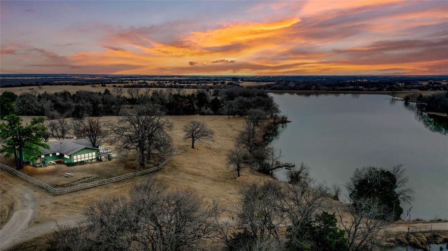 One of  kind ranch located close to Lake Texoma and Pottsboro. The ranch has 2 connecting lake of approx 25 acres plus a 5 acre lake and 2 ponds. There is a cool Lodge overlooking the lake that has 2 large living areas, 3 bedrooms, 2 baths, wrap around porches and fantastic view. The lake provide a great habitat for all types of waterfowls and fish. The ranch has 360 degree views of the countryside with gently rollin terrain. The ranch is currently used as a cow calf operation by a long term tennant. There is good older barn with hay loft, large steel shop building and other out buildings. There is an older frame ranch house at the front of the ranch that is occupied by the ranch manger.  Fenced and cross fenced.The location is only 1 mile from a new subdivision where city utilities may be available. This is small town living at it's best with excellent schools, close to major transportation arteries, shopping, medical services and only minutes from North Texas Regional Airport.
