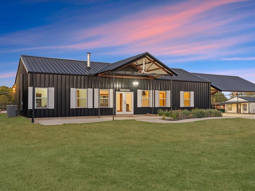 Exceptional opportunity to own a fully high-fenced 84-acres private ranch estate in Parker County, offering a rare blend of luxury living, recreational land, and income-producing potential. Surrounded by rolling terrain, mature trees, and expansive Texas skies, this remarkable property delivers privacy, natural beauty, and the true spirit of Texas ranch living.The ranch has previously operated as a successful guided hunting destination generating approximately $300,000 annually, with infrastructure already in place including shooting houses, protein feeders, corn feeders, and established wildlife management systems. Native and exotic wildlife currently on the property include Whitetail, Axis, Blackbuck, Aoudad, Sika, wild hogs, and Texas Longhorn, creating an exceptional recreational and hunting environment.
The main residence is a thoughtfully designed 3-bedroom, 2-bath metal home offering approximately 1,800 sq ft with an open-concept layout connecting the living, dining, and kitchen areas. A cozy fireplace anchors the living room while large windows bring in natural light and showcase scenic ranch views. Expansive covered front and back porches provide peaceful spaces to enjoy wildlife sightings and stunning Texas sunsets.

Outdoor living is highlighted by a resort-style beach-entry, chlorine in-ground swimming pool, ideal for relaxing or entertaining guests.
Additional improvements include a 1,000 sq ft 2-bed, 2-bath guest cabin or pool house, a separate 1-bed, 1-bath residence with covered porch, detached two-car garage, and a 125x20 covered carport for equipment and vehicle storage. The land also features two ponds, multiple water wells, and cleared perimeter access roads. Whether you are searching for a luxury ranch retreat, a recreational paradise, a hunting destination, or a long-term investment, 7601 Zion Hill Rd offers an opportunity that is both rare and remarkable.
This exceptional Parker County ranch represents more than just a property.