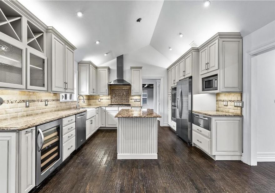 Beautifully updated and expansive, this 3-bedroom, 2-bath ranch-style home is nestled in the highly desirable Preston Hollow neighborhood. The kitchen is thoughtfully customized with high-end upgrades, including a warming drawer and wine fridge. Enjoy gorgeous hand-scraped hardwood floors, two spacious living areas, custom closets, and a well-appointed mudroom. The recently renovated bathrooms feature elegant designer finishes. Outside, you’ll find a beautifully landscaped backyard with a patio, outdoor fireplace, and privacy gate—perfect for relaxing or entertaining. With easy access to the Dallas North Tollway, top restaurants, Whole Foods, and more, this move-in ready home is a must-see!