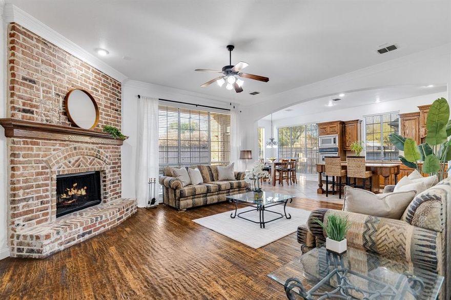 Nestled in the highly sought-after master-planned community of Stonebridge Ranch, this beautifully updated 5-bedroom, 4.5-bath home offers 3,976 sq. ft. of spacious, well-designed living space. Step inside to rich hand-scraped hardwood floors, high ceilings, abundant natural light, and an inviting layout perfect for everyday living and entertaining. At the center of the home, the stunning open kitchen showcases expansive counter space, abundant cabinetry, and a generous island that connects effortlessly to the main living areas. The private primary suite is a true retreat with a spa-like bath and a spacious walk-in closet. A second bedroom on the first floor is ideal for a mother-in-law suite or guest accommodations. A dedicated home office provides the perfect space for those working from home. Upstairs offers exceptional versatility with a game room, media room, balcony, and three generously sized bedrooms, two connected by a Jack-and-Jill bathroom. This home is move-in ready with recent updates including a new roof, fresh interior paint, a freshly stained fence, updated exterior shutters and columns, and refreshed landscaping. Enjoy a private backyard with mature trees and a covered patio, perfect for relaxing or entertaining. Residents of Stonebridge Ranch enjoy an exceptional lifestyle with a golf course, country club, Olympic-size pool, tennis courts, playgrounds, and scenic walking trails throughout the community. Conveniently located minutes from Hwy 121 and Hwy 75, this home is within walking distance of Wilmeth Elementary and close to top rated McKinney ISD schools, shopping, and dining, offering the perfect blend of convenience and lifestyle.