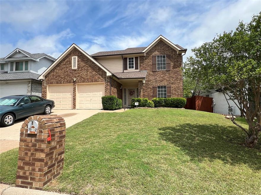 Updated Two Story Brick Home in West Fort Worth, 3 Bedrooms, 2 and one half bathrooms, over size family room with wood burning fireplace and cathedral ceilings, bright kitchen with granite counter tops and new stainless steel appliances, abundance of kitchen cabinets, new laminate wooden floors bottom floor, new elegant ceramic floors in the kitchen, new hardwood floors on the second level rooms, Fresh Interior and Exterior Paint, New Roof in Sept 2025, New Central Air Lennox in 2015, New Duct System in 2021, Both upstairs Bathrooms updated, New Cedar Fencing in the backyard for privacy, Large Backyard with lush landscaping and pavestone retainer walls showcasing mature rose bushes and flowers, Long Rifle Home Ready for Move In and Quick Possession