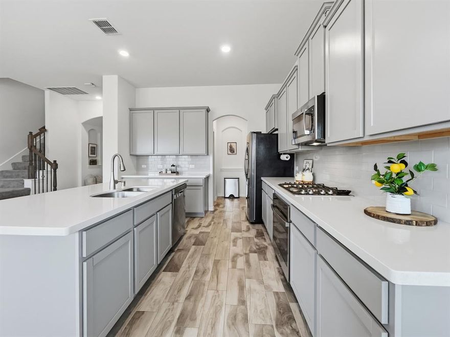 Step into this stunning 4-yr-old home where modern elegance meets family-friendly functionality. At 3,008 sf, this immaculate residence in award-winning Sendera Ranch—named 2025 Community of the Year—offers everything your family needs and more. The moment you enter, you'll be captivated by a soaring ceiling, graceful architectural arches, and art niches that showcase your personal style. The open concept floor plan is perfect for both everyday living and entertaining guests. This well-appointed home features 4 spacious bedrooms, 3 full and 1 half bathrooms, a dedicated study with French doors, an exciting gameroom, and a fully equipped media room for movie nights the whole family will love. Cozy up by the gas fireplace on cool evenings, and enjoy the beauty of wood-look ceramic tile throughout—combining timeless style with easy maintenance. The bedrooms feature neutral carpet for comfort and warmth. The thoughtful layout places the primary suite, guest bedroom and full bath downstairs for convenience, while the additional bedrooms upstairs include a Jack-and-Jill bath. But the lifestyle here extends far beyond your front door. Sendera Ranch offers resort-style amenities including 4 pools, 5 playgrounds, 2 basketball courts, a clubhouse, 2 soccer fields, 2 baseball fields, a hockey rink, gazebo, serene ponds, & miles of scenic paved trails. Your family will never run out of ways to stay active and connected. Perhaps the biggest advantage? This home sits within the highly rated Northwest ISD, with 3 excellent schools right in the community—a dream for families prioritizing education. SPECIAL BONUS: The billiards table and accessories, media rm equipment, & children's play set all convey with a full price offer!
This is more than a house—it's your family's next chapter in one of DFW's most celebrated communities. Schedule your showing today!