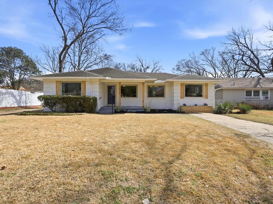 Beautifully updated 4-bedroom, 2-bath home offering 1,414 square feet of well-designed living space. Recent improvements include fresh interior paint, refinished original hardwood floors, and new vinyl tile flooring, creating a clean and modern feel throughout. The functional floor plan features bright living areas with abundant natural light and seamless flow into the kitchen and dining spaces, ideal for everyday living and entertaining. The kitchen offers ample cabinet storage and a practical layout. All four bedrooms are generously sized, providing flexibility for family living, guests, or home office use. Both bathrooms are well appointed and complement the home’s recent updates. Exterior features include a large backyard with a newly constructed wood deck, perfect for outdoor enjoyment. A detached two-car garage offers convenient parking and additional storage. Located in an established Dallas neighborhood with easy access to shopping, dining, and major thoroughfares. Move-in ready.