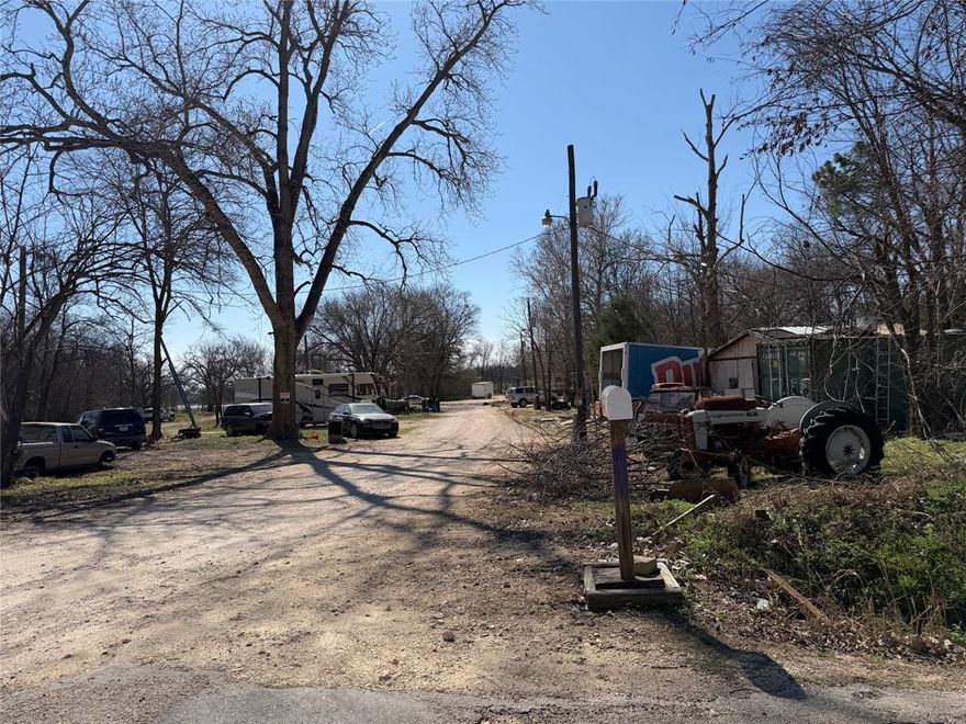 Was previously an RV, mobile home park. almost six acres. Could be a great potential income investment property. Great place for tiny homes, or leave as RV, Mobile home park or build your dream home here. Electric and septic on property. Come take a look and make an offer to see today.