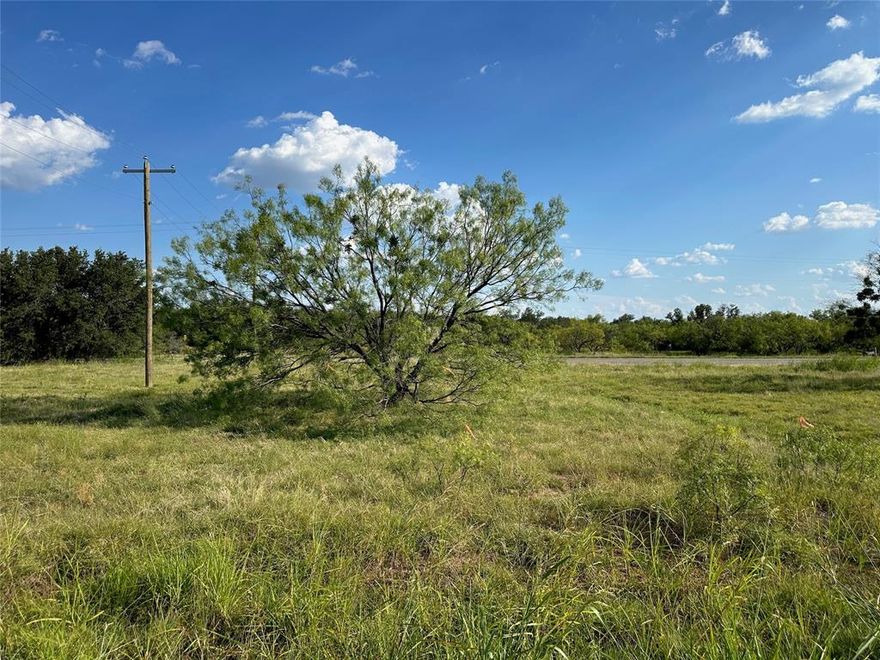 Interior lot 973 on Feather Bay Drive in the Kings Point Cove Resort Community is a nice size lot and has marvelous building sites. This is a prime real estate lot for sale close to Lake Brownwood in Central Texas. This interior lot is located near The Hideout golf course. The property, with approximately 61 feet of road frontage, is fairly level, and located in the beautiful resort community of King’s Point Cove and the Hideout Golf Club. Utilities are currently available. It is a perfect property to build your dream home on and to enjoy all of the amenities The Hideout offers.