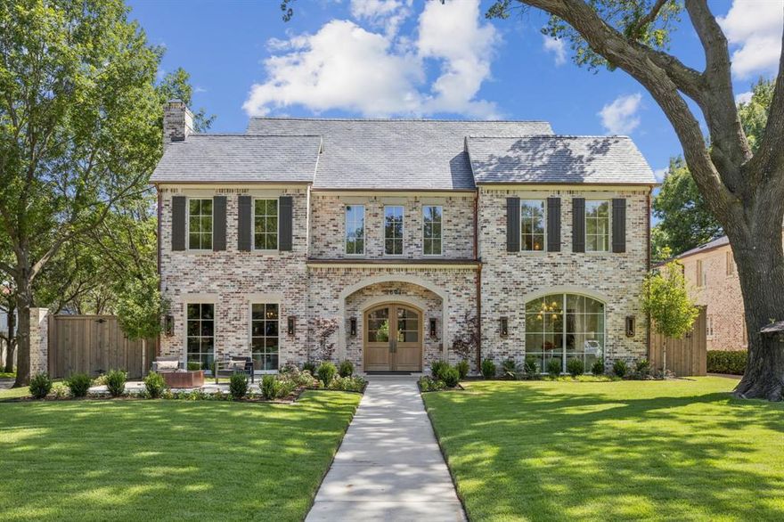 Nestled on an oversized corner lot in the prestigious Fairway of University Park, this stunning three-story transitional-style home spans over 6,450 square feet of carefully curated living space. Offering 5 generously sized bedrooms—each with its own en suite bathroom— this residence was designed with both comfort and entertaining in mind. The main level showcases a chef’s kitchen featuring top-of-the-line Sub-Zero and Wolf appliances, a secondary prep kitchen, and a large walk-in pantry. Entertain effortlessly in the formal dining room, speakeasy-style bar, or expansive family room, all accented by masonry fireplaces and seamlessly flowing to a covered outdoor living area outfitted with built-in heaters for year-round use. Upstairs, the primary suite offers two oversized walk-in closets and a spa-like bathroom, accompanied by a spacious game room and three additional bedroom suites.