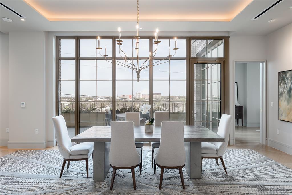 This exquisite home in The Terminal at Katy Trail was designed by acclaimed interior designer Gonzalo Bueno of X+III and is one of only three combined units in the building. The residence occupies the entire west side of the fifth floor, with views of downtown, the Katy Trail, and the Knox Street area. The expansive floor plan provides large open living areas with multiple seating areas and a wet bar for sophisticated entertaining. The dining room opens to a 499-square-foot-terrace overlooking the Katy Trail. The gourmet kitchen is well-equipped with Miele appliances, including a gas range. The spacious primary suite with downtown views includes a sitting area, a beautifully appointed bathroom opening to a terrace, an enormous closet, and coffee bar. Three secondary bedrooms are located on the north end of the residence, all with en-suite bathrooms and large closets. There is also a study with views of the Katy Trail. The Terminal at Katy Trail, designed by Austin-based architect Michael Hsu, also offers fabulous amenities such as yoga, Pilates, delicious dining options, 24-hour concierge, valet, and a state-of-the-art health and wellness day spa.