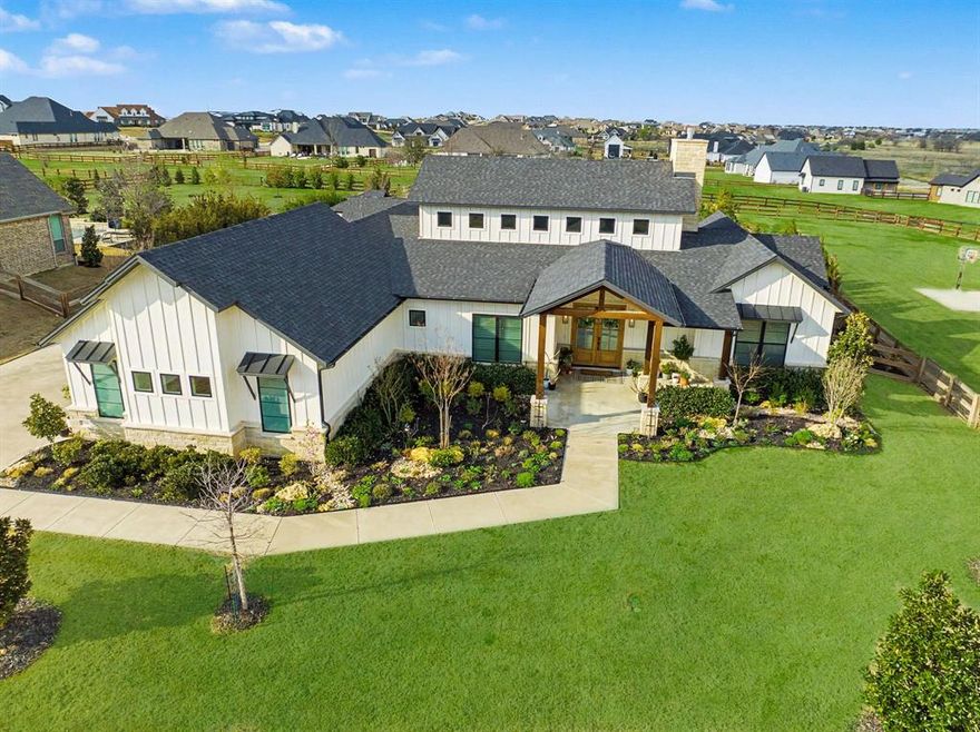 A rare offering of refined single-story living! This stunning Craftsman estate sits on a full acre of beautifully landscaped artistry—an exceptional retreat for those who value space, style, and serenity. Thoughtfully designed with soaring ceilings -the home blends timeless architectural character with modern comfort.
At the heart of the residence, the chef’s kitchen impresses with high-end finishes, generous prep areas, and an effortless flow ideal for both intimate meals and large-scale entertaining. Natural light pours through the living spaces, highlighting the warm textures and elevated craftsmanship that define the home.
A beautifully enclosed patio extends the living area offering a tranquil setting for morning coffee, plant lovers, or relaxed evenings.
Outdoors, the property transforms into a gardener’s dream, with ample room for curated landscaping, raised beds, truly a full garden vision. 
This exceptional single-story estate delivers luxury, livability, and land—an increasingly rare combination in a premier setting.