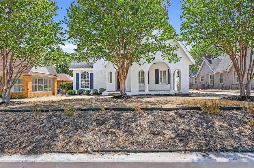 Welcome to 2563 S University Drive, a beautifully restored 1925 Tudor-style home in the heart of Fort Worth's vibrant TCU neighborhood. This spacious 6-bedroom, 4-bathroom residence offers a perfect blend of historic charm and modern updates, all just minutes from campus, shopping, dining, and downtown. Step inside to find original hardwood floors, arched doorways, and updated finishes throughout. The expansive layout includes a fully renovated kitchen with stainless steel appliances, quartz countertops, and custom cabinetry—ideal for entertaining or meal prepping with roommates or family.Upstairs and downstairs feature multiple living areas and generously sized bedrooms with abundant natural light. The home includes a detached garage apartment with 1 bedroom, 1 bathroom, and a private entrance—perfect for guests, rental income, or a private office. Whether you're an investor seeking a turnkey rental near campus, a family looking for space and location, or a TCU alum ready to come home—this property is a rare gem in a sought-after Fort Worth neighborhood.