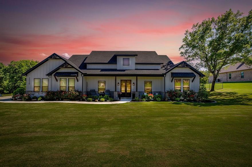 Experience luxury living in Azle, TX with this stunning 2023-built custom home on a pristine 1-acre lot. Boasting 2,682 sq ft, this elevated rustic retreat features 3 bedrooms, 2.5 baths, and a private designated office.

The heart of the home is a chef’s kitchen featuring an 8' granite island with custom pull-outs, a professional pot filler, and a massive walk-in pantry with a dedicated coffee bar. The open-concept interior impresses with soaring ceilings, exposed beams, and a floor-to-ceiling stone fireplace. Retreat to the primary suite featuring a 9' rain shower and a walkthrough custom closet.

Outdoor entertaining is effortless with a resort-style pool and spa, oversized covered patio, and lush acreage. From the stately double front doors to the architectural sliding doors, every detail defines sophisticated Texas living. Your dream home awaits!
