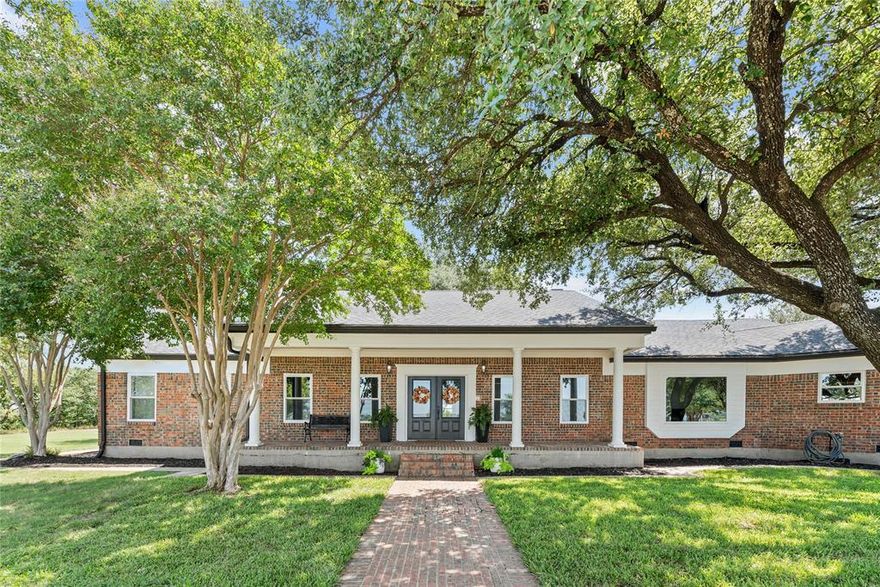 165± Acre Ranch Bordering Whitney, TX – A Rare Opportunity with Lake Views and Development Potential
Welcome to a one-of-a-kind ranch that captures the heart of Texas living—165± acres nestled along the west side of Whitney, TX, offering a seamless blend of natural beauty, agricultural utility, and future development promise.
Residence & Ranch Features
At the heart of the property sits a spacious 3,500 sq ft ranch-style home featuring 4 bedrooms, 3 full baths, 2 half baths, an office, two living rooms, and two wood-burning fireplaces—designed for comfort, functionality, and gatherings of all sizes. The home is complemented by a well-equipped barn with stalls and pens, ready for livestock or equestrian use. Five stocked tanks—teeming with bass, catfish, and crappie—add recreational charm and water access for cattle. The property also offers fantastic dove hunting, making it a true sportsman’s retreat.
Land Composition & Agricultural Use
Approximately 50± acres are planted in coastal Bermuda, while the remaining acreage features a healthy mix of blue stem, Bermuda, and native grasses—perfect for grazing or hay production. The ranch is currently used for cattle and supports a full-time residence, making it turnkey for agricultural operations.
Development Potential & Location Perks
Elevated build sites offer stunning views of Lake Whitney, making this property a prime candidate for future residential development. With utilities in place and proximity to town, the possibilities are endless—from private estates to a thoughtfully planned community.
Location Highlights
• Minutes from Lake Whitney for boating, fishing, and recreation
• 1 hour north to DFW Metroplex
• 1 hour south to Waco
This is more than land—it’s a legacy in the making. Whether you're seeking a working ranch, a private retreat, or a development opportunity with lake views and unbeatable access, this property delivers.