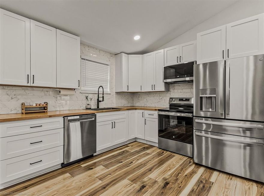 Almost 10 full acres of raw land, perfectly suited for commercial use along State Highway 276 corridor in The City of Rockwall, in Rockwall County.  Property has current AG exemption, but surrounding Planned Development on either side of Highway 276 calls for Light Industrial and Commercial use.  Property currently has a 1095 SF structure that has been fully renovated with new roof, new HVAC, new floors, updated bathrooms and kitchen, and fresh paint, perfectly suited for residential or office with 2 designated rooms and ensuite bathrooms, large living space or conference room, utility room and full kitchen. Second structure on the property is a 1200 SF workshop with concrete floor, electricity, 2 sliding doors and 2 roll up doors which would be perfectly suited for fleet of company vehicles, workshop, storage, boat or RV storage.
Home has been fully renovated, new floor, new paint, new HVAC, new roof, fresh paint throughout, all new kitchen and appliances, two primary suites, each with ensuite bath. Bathrooms have been completely remodeled.  Excellent investment opportunity for live-work set up.