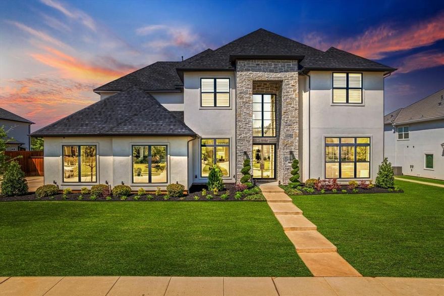 Welcome to your dream home, a breathtaking modern luxury residence that redefines elegance and sophistication. Nestled on an expansive 30,000+ square foot lot in the highly sought-after Southlake Manor, this stunning property boasts an impressive 6 bedrooms and 9 bathrooms within its generous 6,506 square feet of meticulously designed living space.  As you approach this architectural masterpiece, you are greeted by a striking façade that seamlessly blends contemporary design with natural beauty. The grand entrance invites you into a world of opulence, featuring soaring ceilings and an abundance of natural light that floods the open-concept living areas. Every corner of this home has been crafted with precision and style, showcasing high-end finishes and state-of-the-art amenities.  The heart of the home is undoubtedly the gourmet kitchen, equipped with top-of-the-line appliances, sleek cabinetry, and a spacious island perfect for entertaining family and friends. Adjacent to the kitchen is a stylish dining area that flows effortlessly into a spacious living room adorned with floor-to-ceiling windows offering picturesque views of the lush surroundings.  Step outside to discover your own private oasis—an expansive outdoor space ideal for hosting gatherings or enjoying serene moments under the sun. Retreat to the luxurious master suite where tranquility reigns supreme. This private sanctuary includes a spa-like ensuite bathroom complete with dual vanities, a soaking tub, and an oversized walk-in closet fit for any fashion enthusiast. Each additional bedroom offers its own unique charm and en-suite bathroom ensuring comfort and privacy for family members or guests alike.  This remarkable home also includes multiple entertainment spaces such as a media room as well as versatile bonus rooms that can be tailored to fit your lifestyle needs. Massive backyard ready for a pool and sports court. Schedule your tour today and discover paradise!