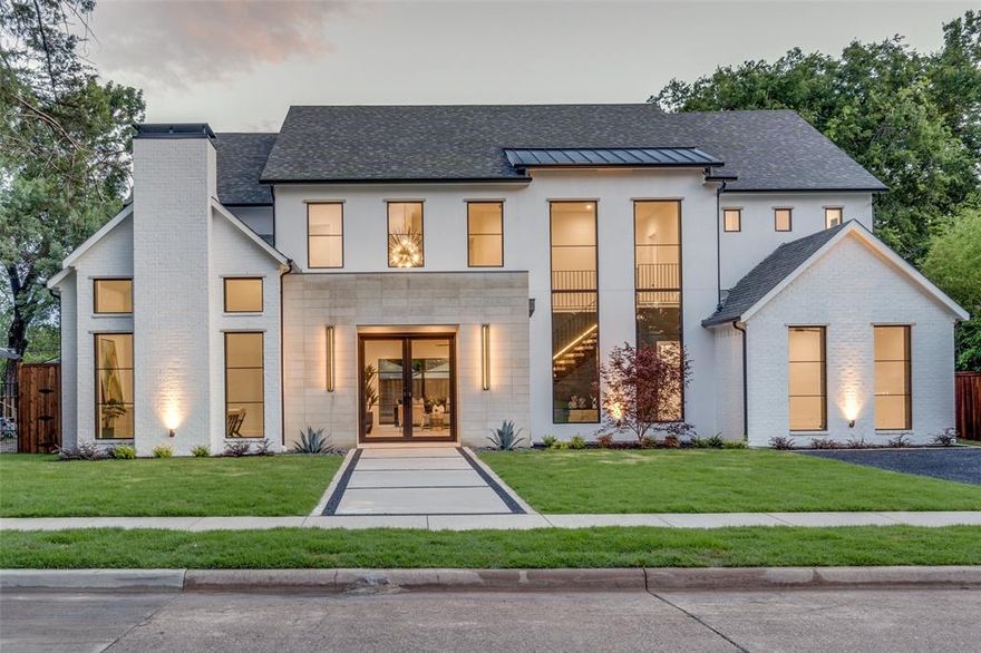 COMPLETED MAY 17! 5732 sq ft, 5 bed, 5.2 baths, Study, and Game Room. This stunning new construction home by Haus & Co Homes has been thoughtfully designed and masterfully crafted in an exclusive Dallas neighborhood w private schools nearby. This magnificent open layout begins w breathtaking floating stairs and 21 ft ceilings in the entrance, a linear fireplace, and designer lighting. An entertainer’s dream, this high-end Kitchen showcases a Professional Thermador appliance package, custom two-tone cabinetry, large island, quartz waterfalling countertops, a desk area, and a private wet bar w a wine refrigerator & ice machine. At the center of this home, you will find a 15 ft wide Western Sliding Door unit that leads to an oversized patio w tongue & groove ceiling detail. The 1st floor master en-suite has a vaulted ceiling and a luxurious bath and an oversized master closet with island storage. Secondary bedrooms include 1 downstairs and 3 upstairs, all with their own private bathrooms.
