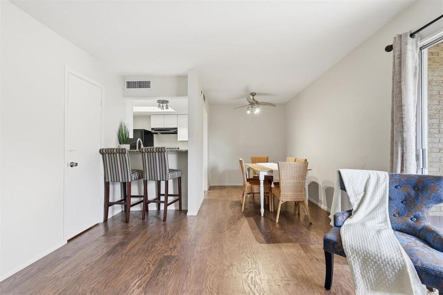 Prime North Dallas opportunity! This beautifully updated 1-bedroom, 1.5-bath condo is move-in ready for first-time buyers or a strong turnkey option for investors. Located on the first floor, it features laminate flooring, new kitchen cabinetry, granite countertops, fresh paint, new carpet, and a spacious living area that opens to a private balcony perfect for morning coffee. The convenient half bath is located downstairs, while the oversized upstairs bedroom offers an adjacent full bath and two large closets. Enjoy a designated covered parking space, access to the community pool, and an unbeatable location within walking distance to shopping and dining, plus quick access to major roads for easy commuting. Furniture is negotiable and can be included with an acceptable offer, making this a flexible and desirable opportunity in the heart of North Dallas.