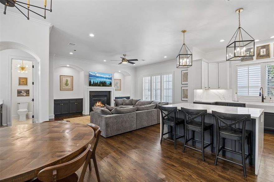 Experience luxury living in the heart of Dallas in this beautifully updated 3-bedroom, 3.5-bath townhome that blends modern elegance with refined comfort. Filled with natural light, the thoughtfully designed interior showcases rich wood flooring, crown molding, and designer finishes throughout, creating a bright and inviting atmosphere. The main living level features an open-concept layout ideal for both everyday living and entertaining. A spacious living area flows seamlessly into the fully renovated eat-in kitchen and dining space, where custom cabinetry, ample storage, and quality materials elevate both style and function. A convenient half bath is also located on this level. All bedrooms are designed with comfort and privacy in mind, each offering its own ensuite bath. The primary suite provides a relaxing retreat with a spa-inspired bathroom featuring dual sinks, a soaking tub, a separate shower, and a generous walk-in closet. French doors in the primary bedroom open to a charming Juliet balcony, adding an elegant touch. An additional upper-level bedroom includes its own private bath, while the entry-level bedroom is complemented by a full bathroom, offering flexible options for guests or a home office. Enjoy private outdoor space perfect for relaxing or entertaining, with French doors that create a seamless indoor-outdoor connection. The outdoor area is well-suited for a variety of uses, including space for pets. An attached garage adds everyday convenience. Ideally located near Turtle Creek Park and within walking distance to Katy Trail, this home offers easy access to downtown Dallas, along with nearby shopping, dining, and major thoroughfares. This residence presents a wonderful opportunity to enjoy comfort, style, and a highly desirable location. 3D tour online!