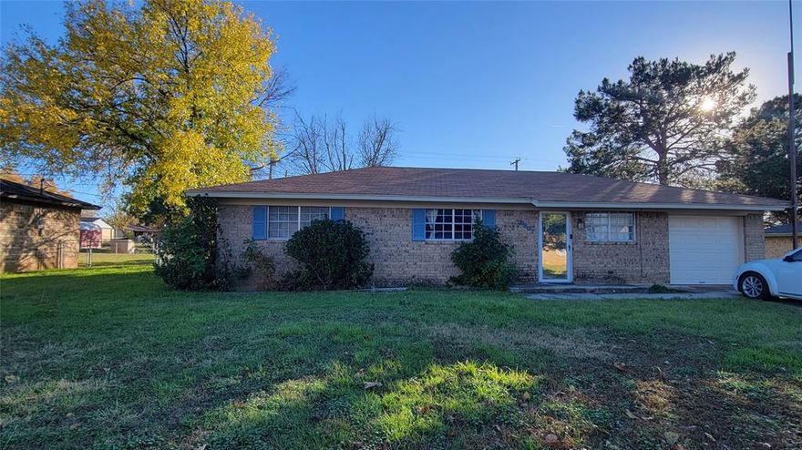 This cute little home is ready for its new owners does need some updating. The home is a 3 bedroom 1 bath home, comes with a large kitchen area. Washer and dryers are situated in garage. There is a one car garage that can be converted if you need more room, extra bedroom or larger living area. There is a chain link fence in the back yard and a fenced in dog run. There is a cute covered patio area in the back yard for entertaining.