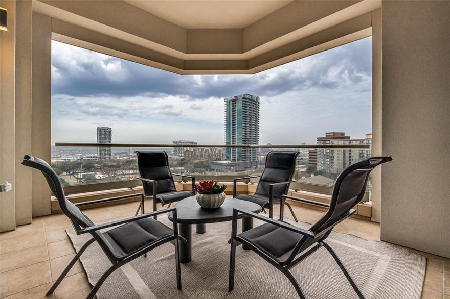 Perched on the ninth floor of The Residences at the Stoneleigh, this light-filled corner residence offers elevated Uptown living defined by privacy, comfort, and unforgettable sunset views. Entered via a private elevator and foyer, the expansive open-concept living and dining area is designed for both effortless entertaining and relaxed everyday living. Walls of windows and a Juliette balcony invite abundant natural light and fresh air, while the seamless connection to a large wraparound balcony creates the perfect indoor-outdoor flow. Outfitted with a television and generous seating space, the balcony becomes a true extension of the home—ideal for gatherings, al fresco dining or morning coffee overlooking the city. The nearby chef’s kitchen adds style and function with a large island breakfast bar, custom cabinetry, stainless steel appliances, and stone countertops. The kitchen’s open sightlines keep you connected to guests and views alike, making it the perfect centerpiece for entertaining.

The primary suite serves as a true retreat, highlighted by a beautifully appointed marble bath featuring a spacious dual-entry glass shower, separate vanities with abundant storage, and an impressive 21-foot custom closet. A guest suite with ensuite bath offers versatility for visitors, a home office, or a charming nursery.

The Residences at the Stoneleigh offers a full suite of resort-inspired amenities, including a pool and hot tub with fire features and grilling areas, a landscaped lawn and pet park with skyline views, an event space with catering kitchen, fitness center, club-style locker rooms with steam and dry saunas, a private theater, owners’ lounge, 24-hour concierge and valet.

Located in the bustling and walkable Uptown neighborhood, this home places you moments from premier office space, eclectic dining and shopping, and the city’s most popular destinations - from the Katy Trail and the Crescent to the Arts District and Turtle Creek Park.