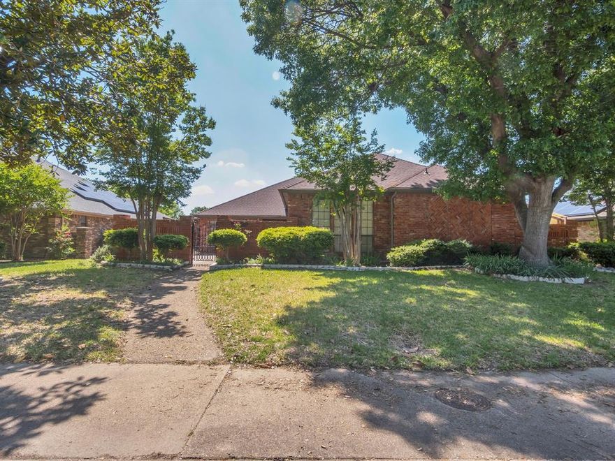 Beautifully maintained and updated 4-bedroom and 3-full bath 1-story home in the highly desirable Woodbridge Subdivision. Richardson ISD. Excellent curb appeal and charming private brick-laid courtyard. This home offers an open floor plan with soaring ceilings and a spacious living room seamlessly connected to the dining area and wet bar. The stunning kitchen features granite countertops, modern updates, and a cozy breakfast nook with views of the front private courtyard. A versatile flex room can also be used as a second living area or media room with sliding doors to the backyard. The home has a nice backyard with an extended patio with pergola cover, great for outdoor cookouts and activities. Tucked away near a quiet cul-de-sac with minimal traffic, minutes from local markets, shopping centers, and Hwy 635.