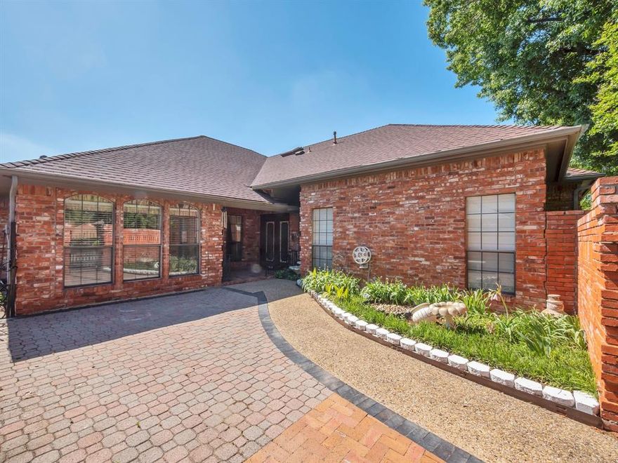 Beautifully maintained and updated 4-bedroom and 3-full bath 1-story home in the highly desirable Woodbridge Subdivision. Richardson ISD. Excellent curb appeal and charming private brick-laid courtyard. This home offers an open floor plan with soaring ceilings and a spacious living room seamlessly connected to the dining area and wet bar. The stunning kitchen features granite countertops, modern updates, and a cozy breakfast nook with views of the front private courtyard. A versatile flex room can also be used as a second living area or media room with sliding doors to the backyard. The home has a nice backyard with an extended patio with pergola cover, great for outdoor cookouts and activities. Tucked away near a quiet cul-de-sac with minimal traffic, minutes from local markets, shopping centers, and Hwy 635.