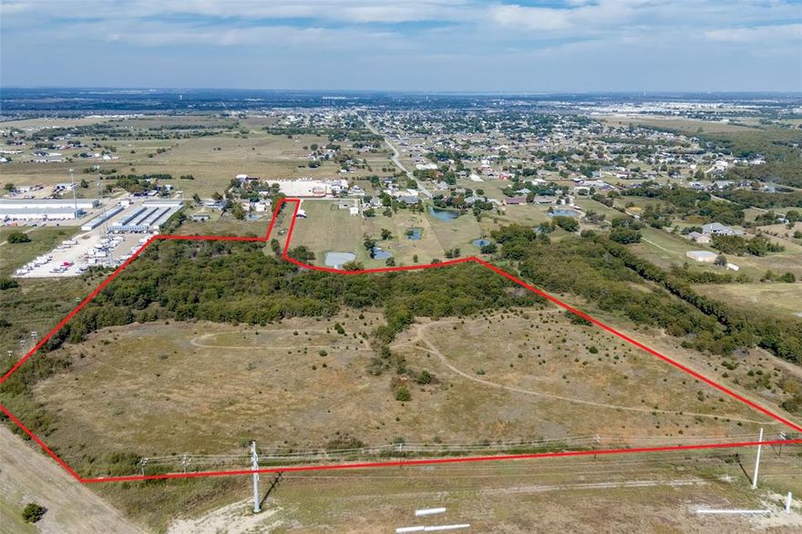 Prime development opportunity of 34.448 acres with optimum visibility from I20!  Access to property is on Helms Trail.  Wooded land that backs to neighborhood with access off Helms Trail.  Property is outside city limits and outside the ETJ and also outside Talty ciity limits and ETJ.  No known land use limits.  Tremendous potential for residential development, RV park, Storage, Retail and so much more!  No current survey, See transaction desk for tax map with boundary lines.  New survey has been ordered.