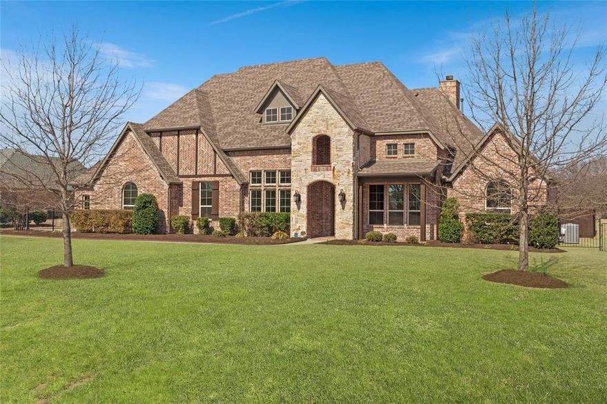 Fully upgraded, system-forward home where the big-ticket improvements are already complete. With a dedicated office, media room, and detached pool house, this property offers flexibility, privacy, and serious entertaining power. Hardwood floors run throughout the main living areas, anchored by a floor-to-ceiling stone gas fireplace in the open-concept family room. The kitchen was designed for real cooking — not just looks — featuring a Liebherr refrigerator, GE Café double ovens, Thermador 6-burner cooktop with griddle, Fisher & Paykel dishwasher drawers, built-in RO water system and outlets pantry. The primary suite is a true retreat with a spa-style bath showcasing an oversized solid-surface soaking tub and expansive walk-through shower with body jets and rain head. The custom closet includes a center peninsula and extensive built-in storage.
Equipped with smart switches throughout, all LED lighting, 3M solar privacy window tinting, whole-home surge protection, fire suppression sprinklers, advanced security, new HVAC system, and a new roof. New water heaters with a recirculating pump as well as whole-house water softener. Even the laundry room is thoughtfully designed with the security hub and plumbing for a secondary refrigerator. Upstairs, the attic is already framed and plumbed for a future bedroom with full bath, two closets, and private entrance — a rare opportunity to expand without major structural work.
Outdoors feels like a private resort. The oversized pool features an integrated infinity edge spa, fire feature, and expansive tanning shelf. Travertine patios, built-in gas grill, and large outdoor gas fireplace create a space built for hosting. The detached, self-contained pool house functions as a guest suite or private apartment. The yard is fully fenced and gated and backs up to a greenbelt. Oversized 3-car garage fits a full size truck.
If you’re looking for a move-in ready home where the upgrades go far beyond surface level, this one stands apart.