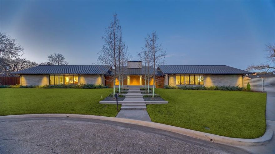 Rare Opportunity!  Beautifully landscaped .63 Acre lot (27,269 square feet) per Dallas Tax Rolls, is located on a quiet Cul-de-Sac in the sought after neighborhood of Janmar.  This 4,832 square feet residence offers timeless design, exceptional privacy and seamless indoor-outdoor living.  
The interior greets you with loads of natural light.  This home was built for both entertaining and everyday living with over-sized living and dining areas.  The Seller has invested over $1,500,000 on the exterior and landscaping of this home.  Ask the listing agent for a list of the upgrades.