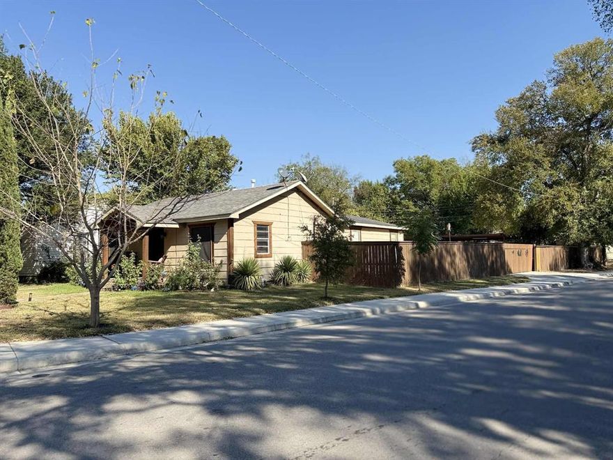 Receive up to 1% credit toward closing costs when using our preferred lender.
Charming Arlington Heights Gem with Private Gated Parking!
Nestled in the heart of Fort Worth’s sought-after Arlington Heights neighborhood, this well-maintained home blends classic character with everyday comfort. From the moment you arrive, you’ll appreciate its inviting curb appeal and the convenience of a side-back gated entry to private parking—a rare find in this area!

Step inside to discover aunique layout in the  living  and dining areas that flow seamlessly, perfect for entertaining or relaxing after a long day. The kitchen features ample cabinetry and counter space, ready for your personal touches. Each bedroom offers generous storage and natural light, while the bathrooms maintain their timeless charm.

Outside, you’ll enjoy a cozy backyard with plenty of room for gardening, grilling, or enjoying evenings under the Texas sky. The secure gated parking adds peace of mind and easy access, ideal for multiple vehicles or guests.Included is a  small workshop with electricity that can be utilized for storage or a workshop.

Located minutes from Downtown Fort Worth, the Cultural District, Camp Bowie shopping, and local dining favorites, this home offers the best of city living with a neighborhood feel.

Sold AS IS – No repairs will be made. The home has been lovingly maintained and is ready for its next chapter. Whether you’re a first-time buyer, investor, or someone ready to put your personal touch on a great property, this one’s full of potential and opportunity!