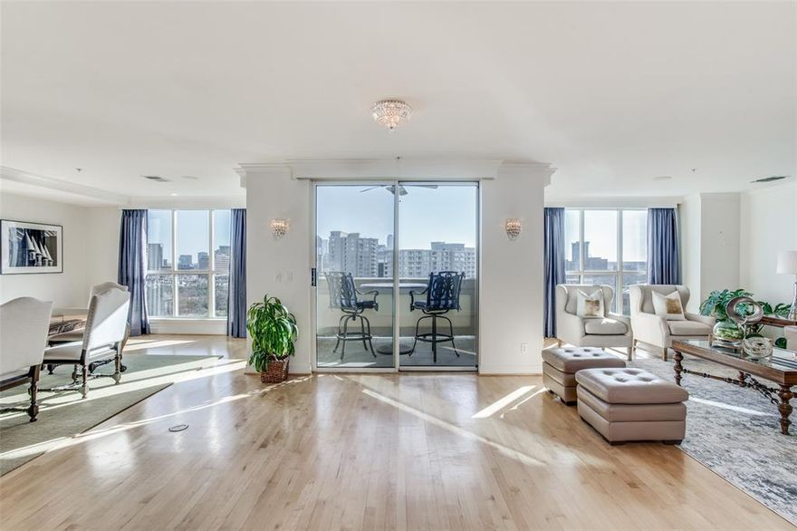 4620 sq ft double unit with expansive views of Turtle Creek Park & Downtown skyline. 2 split Primary Suites have marble Baths, separate tubs & showers, 2 vanities & 2 walk-in Closets each. The reconfigured open floor plan encompasses a gracious Living area, large Dining area & an island Kitchen with granite counters, a Breakfast Bar, SubZero refrigerator, gas cooktop & convection ovens, all overlooking 1 of 4 Balconies. The comfortable Media Room sports rich wood paneling, a wall with 2 large-screen TVs & a Wet Bar. The spacious Library-Office has a wall of built-ins & is next to the Exercise Room. The largest Primary Bedroom has a Living-Sitting-TV area, 2 Balconies & a 27 ft double-size bath. Amenity-rich Mayfair has 24-hour doorman, valet, heated pool-spa, fitness center, business center, top-floor Sky Club with 2 fireplaces, bar & full kitchen, Billiards-TV room, Roof-top Deck with seating, grills & 360 views. Lock & Leave convenient to Katy Trail & TC Park. 4 Parking, 2 Storage.