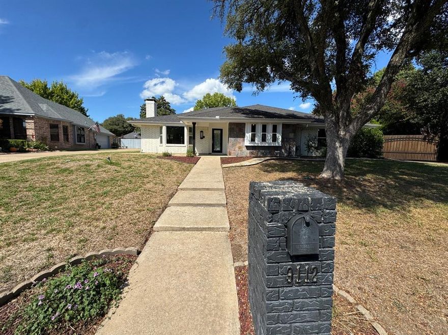 Single-story brick home located in the peaceful and sought-after Secret Harbor community, with a voluntary HOA offering access to a waterfront park and boat launch on Eagle Mountain Lake. This spacious 3-bedroom, 2.5-bathroom home offers 2,788 sq. ft., including a garage conversion that can serve as a 2nd living room, game room, office, or 4th bedroom. Zoned for the new Eagle Mountain High School. Interior highlights include a large living area with a stone fireplace and built-ins, a bright kitchen with double ovens, granite countertops, and ample cabinetry, plus a generous primary suite with dual vanities, soaking tub, walk-in shower, and walk-in closets. Additional features include large windows for natural light, a long gated driveway to the backyard, covered patio, and ample parking. Per previous listing, roof was replaced approx. 2 years ago with 50+ year shingles (buyer to verify). Seller makes no representations or warranties. The voluntary HOA provides access to a waterfront park with boat launch, playground, tennis and basketball courts, greenbelts, community events. This VA-owned property is attractively priced and an excellent opportunity to own in a desirable lakeside community. All measurements, square footage, and school information are approximate and should be independently verified. Property is owned by the Secretary of Veterans Affairs and sold AS IS.