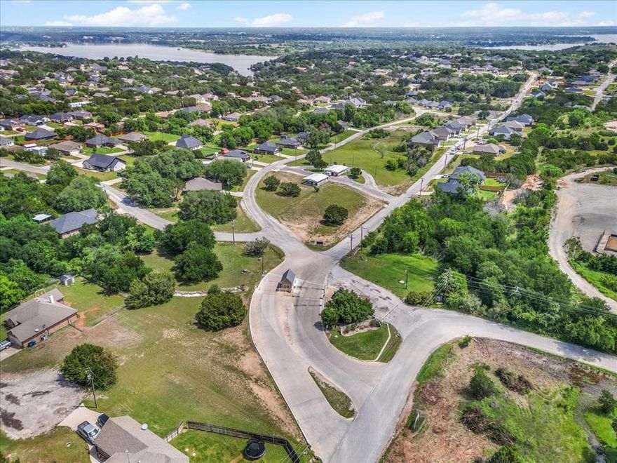 Modern Comfort & Massive Backyard Potential
Experience the best of Granbury in this 2021-built home! Featuring 3 spacious bedrooms and a chic, open-concept layout, this home feels brand new. The kitchen and dining areas are designed for gathering, while the gated community provides a vacation-like atmosphere with a pool and lake access.

Love the outdoors? You'll adore the beautiful, large backyard—a rare find! While the home currently features a 2-car carport, there is plenty of room to build out a full garage. Close to the lake and even closer to the shops and culture of the Historic Square. Don't miss this opportunity for a turnkey lifestyle!