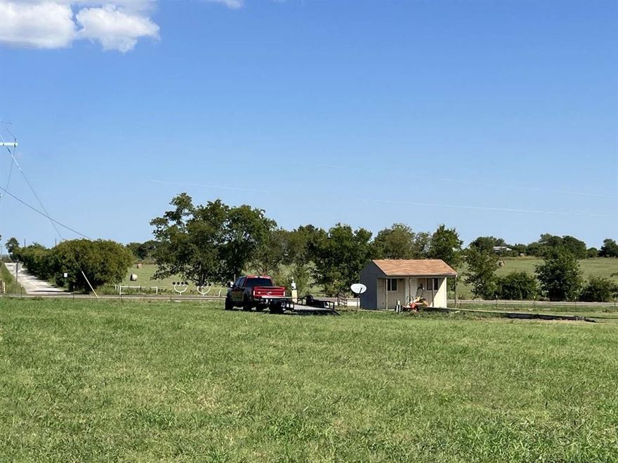 18.25 acres of beautiful rolling North TX Hill Country. Electric & water on property, septic needed. Property completely fenced including a 15x20 shed with a 6x20 nice porch wired with electric inside & out. Quite country surrounding yet close proximity to the DFW metro-plex areas. Currently agriculture exemption on property.