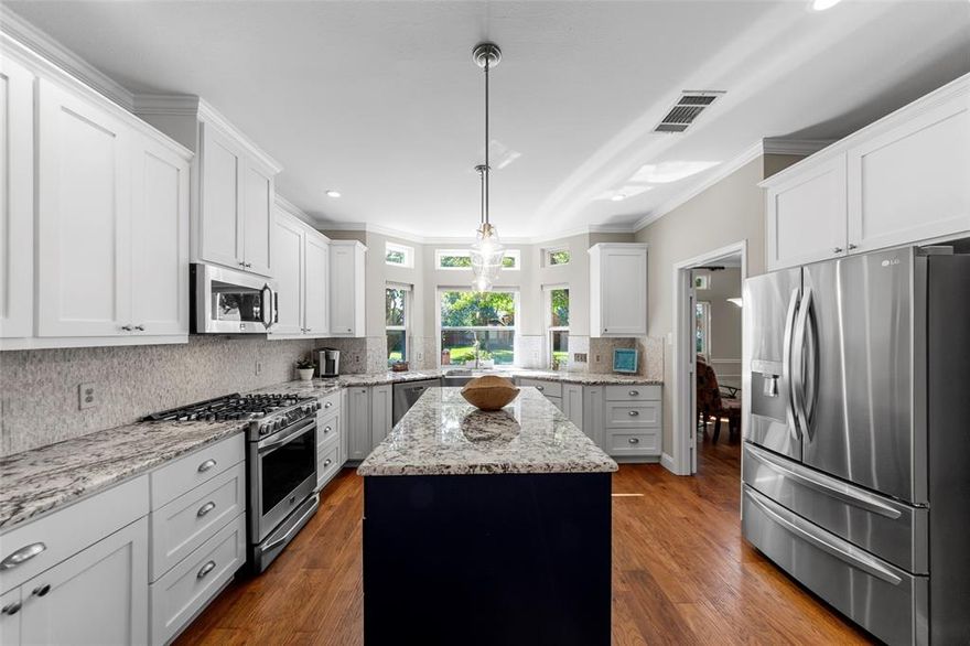 FABULOUSLY UPDATED home with POOL & SPA in the coveted neighborhood of Watters Crossing in West Allen. ORIGINAL OWNERS - This meticulously maintained home boasts pride of ownership! The stunning front door and charming curb appeal say ‘Welcome Home’! As you enter, you are greeted by the soaring ceilings of the foyer. This home is so light & bright with updated vinyl windows throughout! BEAUTIFULLY UPDATED kitchen with oversized island, granite counters, tons of cabinet & counter space, GAS range, stainless steel appliances, walk-in pantry, and a bay of windows that flood the room with natural light. Living room with stunning floor-to-ceiling stacked stone gas fireplace and views of the pool & yard. Open-concept floor plan with additional formal living and dining rooms allows for plenty of space to entertain. Easy-care wood floors throughout the home — no carpet! Large primary suite with spa-inspired ensuite bath — featuring a walk-in frameless glass shower, dual sinks, large soaker tub, and walk-in closet with custom closet system. Spacious secondary bedrooms. One bedroom features a built-in Murphy bed that is great for overnight guests. The back bedroom features a built-in desk & cabinets, making for a great home office space or craft room. Updated hall bath upstairs and half bath downstairs for guests. Outside features your own personal oasis with the sparkling pool & spa. The backyard has a turfed yard for easy maintenance! The garage is every handy man's dream - built-in workbench and cabinets, plenty of shelving storage opportunities, & an electric lift that allows for easy moving of items to & from the attic! Just located down the street from Watters Crossing Park & playground! You do not want to miss out on this amazing opportunity in award-winning Allen ISD! Check out all the great amenities that Watters Crossing has to offer - Community pools, club house, play grounds, pickleball, basketball, sand volleyball, tennis, ponds, hike & bike trails & more!