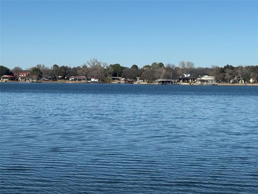 The moment you arrive at this stunning waterfront lot, you’ll be ready to fall in love. Take a deep breath, relax, and begin imagining your future dream home coming to life. This rare, one-of-a-kind property offers over 150 feet of pristine waterfront on the main body of beautiful Granbury Lake, with water reaching 35 feet deep right off your property. Enjoy wide-open, unobstructed lake views that stretch as far as the eye can see.
This exceptional almost double size lot is graced with mature trees providing plenty of shade during the summer, perfect for relaxing outdoors. Build your dream boathouse or take advantage of a community boat ramp for easy lake access. No hesitation—opportunities like this are rare and highly sought after. This is a prime, one-of-a-kind investment asset with serious upside potential. Industrial-grade value, irreplaceable location, and long-term return all wrapped into one. Call me today to schedule your private tour and secure this property before it’s off the market.