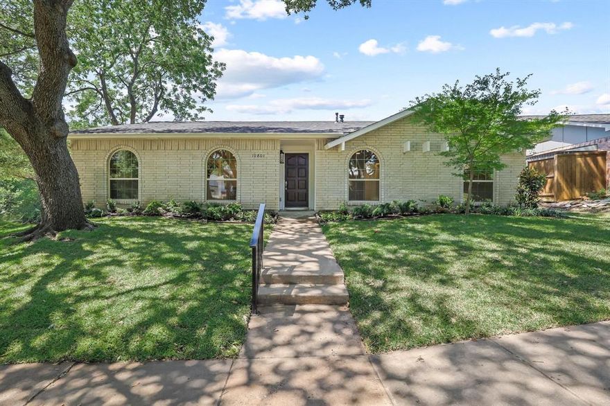 Remodeled to perfection, this picturesque home in Lake Highlands sits on a quiet corner lot next to a green space! Located in RISD schools and feeds into Wallace Elementary. 3 Bed, 2 bath plus an office, playroom or flex room. Vaulted ceilings, engineered wood floors, custom inset kitchen cabinets with plenty of storage and a beautiful custom fluted oak wood oval island. The house was fully rewired with a new panel, new condenser and ductwork, new roof, new windows, piers added with transferrable warranty, ceiling raised in various areas and new drywall added, new doors, trim and concrete patio, new insulation in attic, new sprinkler system, new sod and landscaping. Butler's pantry added, laundry room added, office added, additional closet space added in primary bedroom.