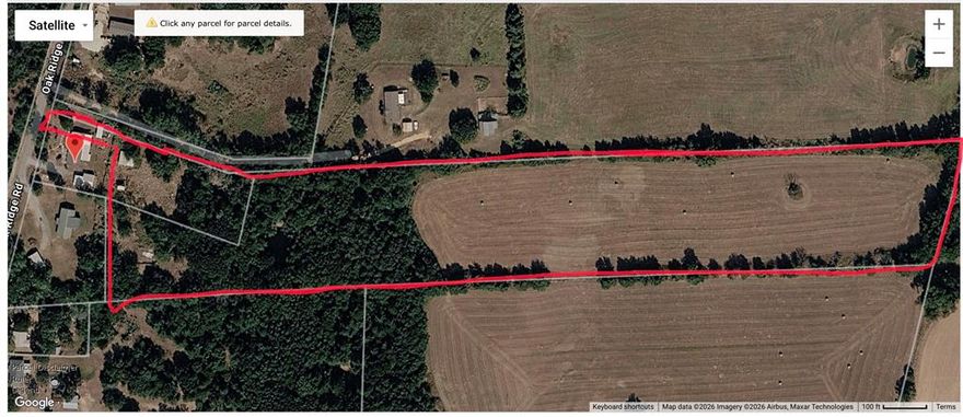 Property to be replatted and will be approximately 14 acres. Home is not included. Current address of land is 2848 Oak Ridge Road and 2826 Oak Ridge Road. There is an easement on other side of fence from 2848 Oak Ridge. It is approximately 2 car widths wide. Easement has not been surveyed yet. It is not the 1st easement that is roaded, it is next to that one which belongs to the neighbor. Back of property is currently being used for hay. Mobile homes are allowed. There are two metal buildings on property and a pond. So many options for this property!
