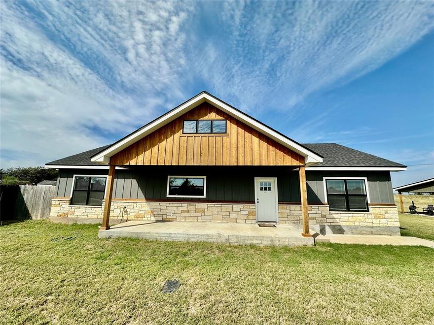 This spacious 2,300 square foot house has everything you need for comfortable living. With four bedrooms and two bathrooms, it offers plenty of space for families or anyone who likes extra room. Located on the edge of town but still within city limits, this home feels like country living while being close to town. The large fenced-in backyard is perfect for kids to play or for pets to roam freely. You will find a dedicated laundry room, making chores much easier. The home is a single story, which adds convenience. The kitchen is beautifully designed with granite countertops and built-in cabinets, providing both style and storage. The main bedroom is large and inviting, featuring its own bathroom with a stylish walk-in shower, a spacious walk-in closet, and a relaxing bathtub. This house truly combines comfort, style, and a great location for the perfect family home.