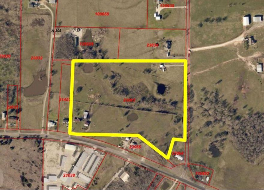 Welcome to your own private retreat on 21 acres of picturesque acreage offering privacy and multiple options! This unique property features a charming home with multiple ponds and scattering trees! Perfect for outdoor living or ideal for future development. Weather you're looking for a personal piece of paradise, family compound, or an investment opportunity, this land offers incredible flexibility. With ample road frontage and utilities in place the property is ideal for sub-divining. Seller has home and 2 acres for $350,000 and the remaining 21 acres can be subdivided at sellers discretion. Land is currently AG and could possibly be allowed for commercial. OUTSIDE CITY LIMITS and LOW TAX RATE 1.77 approximately