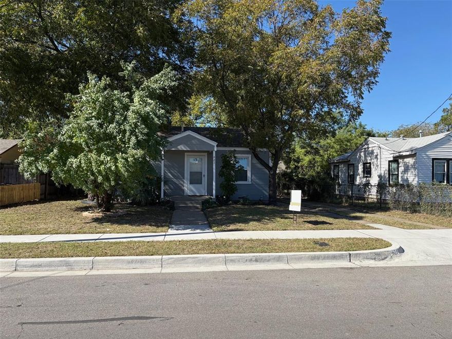 Beautifully  clean and updated 2 bedroom 1 bath home.  New heat and ac units,. The living room feaures an electric fireplace and new flooring, The kitchen has a gas stove and a full utitity closet , The entire home has new flooring ,windows and stormdoors. The backyard is large with a garage and workshop in one building needs some work. and fully fenced Be sure to review the photos. this home has easy access to freeways,shopping and dining.