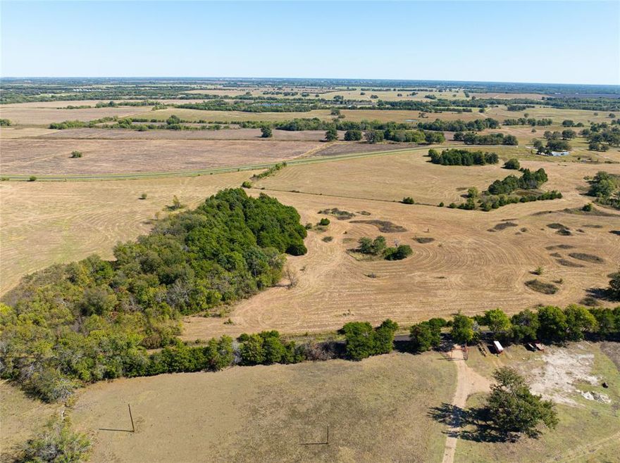 This 11-acre tract, Tract 2 of 12 available, is located just south of Paris, TX, offering a mix of open space and partially wooded areas. With road access on two sides, the property provides convenient entry while maintaining privacy. Just minutes from the small town of Roxton, you’ll enjoy easy access to grocery shopping and dining while still experiencing the quiet of rural living. This versatile tract is an excellent opportunity to build your homesite, create a weekend retreat, or invest in a growing area.