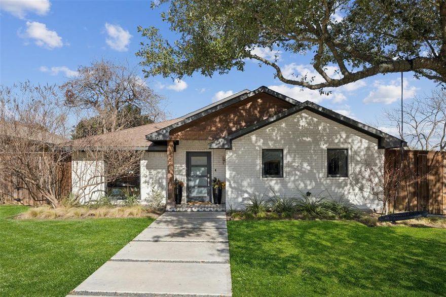 Fully updated and ideally situated on a rare double corner lot within walking distance to Lakewood Elementary, this exceptional home offers refined living with spaces designed for both everyday comfort and memorable entertaining. A welcoming foyer creates an elegant first impression and leads to a dedicated office with glass doors—perfect for working from home. The open-concept layout features a spacious living room with custom built-ins and a fireplace, seamlessly connecting to a generous dining area and a show-stopping full bar with open shelving, built-ins, two beverage refrigerators, and sliding doors opening to the backyard. The gourmet kitchen is an entertainer’s dream, outfitted with an oversized built-in refrigerator, double ovens, gas cooktop with griddle, wine tower, apron-front sink, and abundant cabinetry. The private primary suite is a true retreat, showcasing vaulted ceilings, ample space, and sliding doors to a secluded backyard escape with a fire pit. The thoughtfully designed primary bath features dual sinks, a soaking tub, an oversized separate shower, herringbone tile flooring, and a walk-in closet. A cozy den with built-ins and a bay window seat overlooks the pool and backyard, providing a perfect secondary living space. Three additional bedrooms are served by two well-appointed bathrooms. The backyard is an entertainer’s paradise with lush landscaping and a privacy fence, featuring a built-in fire pit, in-ground pool with infinity-edge spa, outdoor kitchen with dining area, and even a batting cage. Additional highlights include a downstairs media room (not included in square footage) that can be converted back to a two-car garage and a full-size laundry room. This one-of-a-kind property blends luxury, functionality, and an unbeatable Lakewood location.