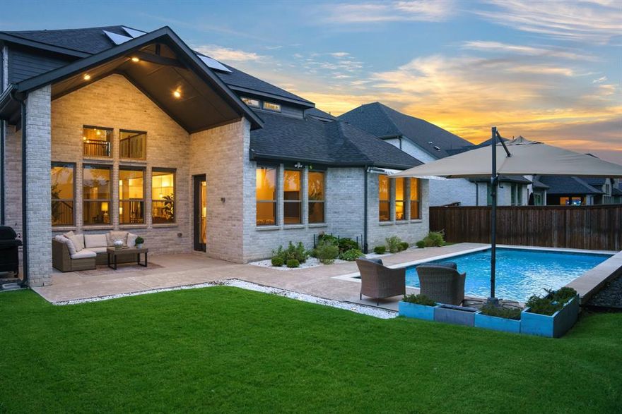 Welcome to modern luxury in Allen ISD! This beautifully designed 3,562 sq. ft. home offers clean lines, open spaces, and thoughtful features throughout. Enter through a grand two-story foyer and enjoy a private office with glass French doors- perfect for working from home. The open-concept kitchen makes everyday cooking easy with white shaker-style cabinetry with brass hardware, double ovens, a 5-burner gas cooktop, and smart lighting. A large island provides plenty of space for casual meals, meal prep and family gatherings. The spacious main-level primary suite features dual vanities, a makeup area, linen closet and its own sitting space. Downstairs also provides a private guest suite perfect for visitors or multi-generational living. Upstairs, one secondary bedroom includes a built-in Murphy bed, maximizing flexibility and space. The two large bedrooms are connected by a Jack-and-Jill bath providing each bedroom with its own private vanity and walk in closet. A dedicated media room, and a game room offer plenty of room for everyone whether its work, play or family movie nights. Smart home features include electric shades, solar panels, and a Tesla charger in the epoxy-floored garage. The backyard is your personal retreat with a refreshing saltwater pool and covered patio, ideal for entertaining or unwinding. Located in a welcoming community with a pool, playground, park, scenic trails, and a clubhouse for gatherings. Walking distance to top-rated elementary school and just minutes from shopping, dining, and Hwy 121. This home is the perfect blend of style, comfort, and convenience- come see it for yourself!