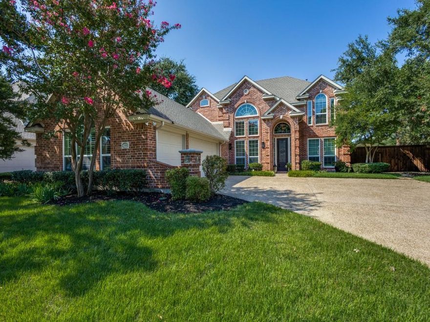 This gently lived in and well maintained Stonebridge Ranch home is a must see! This beautiful home offers an open living, dining and kitchen area, and features five spacious bedrooms with four full baths. The home has rich laminate wood floors throughout the first level with tile in all baths and the laundry. Interior finishes are excellent with plantation shutters, soaring ceilings, an abundance of crown molding, beautiful corner accent millwork, and upgraded light fixtures and ceiling fans. The kitchen offers light quartz counter tops, SS appliances with a built-in oven and gas burner cook top, and a cozy breakfast eating area.  The large family room with a central gas log fireplace and vaulted ceiling features a wall of windows and view to the beautiful back yard pool area. This flexible floor plan offers two bedrooms and two full baths on the first level. The second downstairs bedroom can also be used as an office. The upstairs floor plan is split with two bedrooms and a jack and jill bath on one side and the large game room or media room and third bedroom and full bath on the opposite side. Out back on the oversized lot there is a lovely patio and pool area with a spa. Updates in the past 5 years include new flooring, plantation shutters and blinds, new windows, quartz kitchen counter tops, one HVAC zone, both hot water heaters, pool re-plastered and a new pool pump, and new sod in the front yard. Stonebridge Ranch in McKinney offers incredible amenities including a resort style community pool, a clubhouse, walking trails, playgrounds, tennis courts and a golf course. This home is an awesome find and is located just minutes from shopping, schools, and major commuting roads.