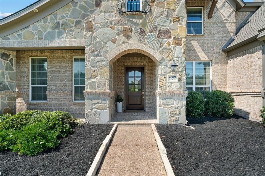 Stunning luxury residence nestled on a pristine 1-acre lot in the exclusive gated community of Montalcino Estates, located in Argyle ISD and close to Liberty Christian Private School.This beautifully crafted custom home offers a seamless blend of timeless design, modern functionality, and exceptional craftsmanship. With 4 spacious bedrooms, a flex room that can serve as a fifth bedroom, 4 full bathrooms, and a powder bath, the thoughtfully designed layout provides abundant space for both family living and guest accommodations.The private master suite is a true retreat, featuring its own entrance to the outdoor patio, a spa-inspired bathroom, and an oversized walk-in closet. At the heart of the home is a chef’s dream kitchen, complete with an expansive waterfall island, high-end appliances, custom cabinetry, and a wall of windows offering breathtaking views of the backyard.Designed for both everyday living and entertaining, the home boasts two living areas, a media room, and a private office.Step outside to discover an incredible outdoor living space, including a stone fireplace, a built-in kitchen, and a vast yard with endless potential to create your dream backyard oasis,making this estate truly one-of-a-kind.Beyond its elegance and charm, the home offers unmatched convenience. The gated community features top-tier amenities such as a gym, swimming pool, tennis and pickleball courts. You're just a short drive from DFW International Airport, close to the highly regarded Liberty Christian School, and zoned to the acclaimed Argyle ISD—one of North Texas’s most sought-after school districts.Whether you're looking for your forever home or a peaceful retreat with convenient access to the Metroplex, this exceptional estate offers the perfect combination of luxury, comfort, and location. Just replaced Roof and Brand New carpet in downstairs bedrooms.