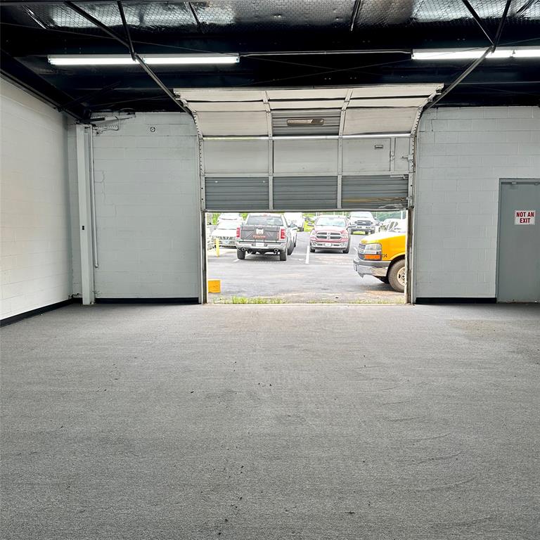 FENTON MOTORS ADDN - Commercial Lease