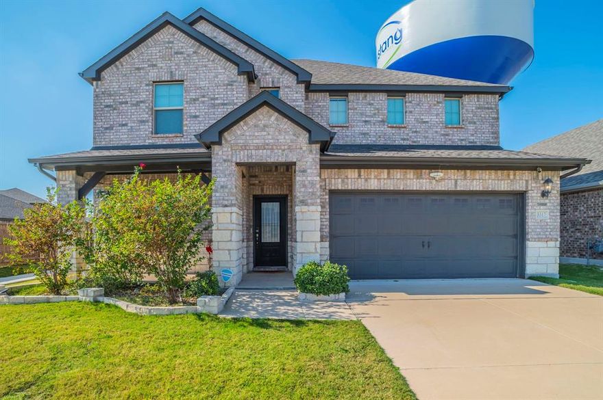 Spacious and modern 5-bedroom, 3-bathroom two-story home that offers a 3.1% assumable loan if approved! with striking curb appeal and an open-concept main level ideal for everyday living and entertaining. Enjoy vaulted ceilings, abundant natural light, wide-plank wood-style flooring, and a bright chef’s kitchen with a center island, quartz counters and stainless-steel appliances. Generously sized bedrooms and well-appointed baths provide comfort and flexibility for families, remote work, or guests. Finished with fresh neutral paint and thoughtful finishes throughout — move-in ready and centrally located near shopping, schools and major commuting routes. Conveniently located in a desirable DFW neighborhood with easy access to schools, shopping, dining and major roadways. Great community amenities nearby — ideal for growing families and professionals.