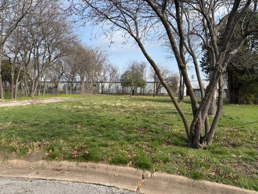 Ready to build.   Flat, level lot with some trees, on cull d sac in existing neighborhood.  Water and sewer available.