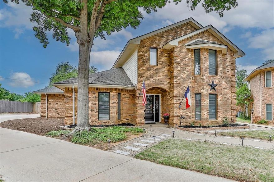 This RARE Arlington gem delivers a lifestyle of space, comfort, and backyard resort living with no HOA, an oversized lot, and a private pool oasis just minutes from everyday conveniences, major employers, and entertainment. Located in a well-established neighborhood off Nine-Mile Creek and near Lake Arlington, this home places you near I-20, Highway 360, and SH 303 for effortless commuting to The Parks at Arlington, Globe Life Field, AT&T Stadium, Six Flags Over Texas, and dining and retail along Matlock Road and Cooper Street, with grocery stores like Kroger, Sprouts, Walmart, Target, fast casual favorites, coffee shops, and restaurants just a short drive away. Inside, the traditional floor plan offers generous living spaces including a welcoming living room with a wood-burning fireplace and bay window, a formal dining room accented by chair rail molding, and an island kitchen featuring granite countertops, stainless appliances, travertine backsplash, updated lighting and hardware, abundant cabinetry, breakfast bar, and cozy eating area with window seat and built-in hutch. The main level primary suite provides bay window views and an ensuite bath with dual sinks, a separate shower, jetted tub, and walk-in closet, while upstairs you’ll find a large game room with balcony access, three additional well-sized bedrooms, and a full bath. Updates include fresh interior paint, newer HVAC units under 3 years old, no popcorn ceilings, and the oversized side J-style entry garage with long driveway offers great parking and storage. Step outside to your private backyard sanctuary where a covered patio overlooks the sparkling pool and spa—perfect for entertaining, relaxing, or creating your own outdoor haven. This home truly blends space, location, functionality, and lifestyle in one exceptional Arlington address.