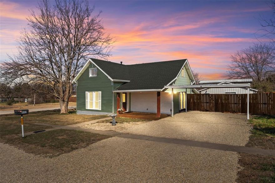 Welcome to this beautifully remodeled home in the heart of Krum! Conveniently located near UNT and TWU, this versatile property is ideal for first-time homebuyers, seasoned homeowners, or investors. Recent updates include new flooring, fresh interior paint, and updated lighting and plumbing fixtures throughout. The open-concept floor plan features a spacious family room with room for a breakfast area, creating a bright and inviting living space. The home offers two bedrooms and two full bathrooms, including a newly added bathroom, as well as a designated laundry room for added convenience. The finished-out garage adds exceptional value, offering a large studio apartment complete with a full bath and breakfast bar—perfect for guests, rental income, or multigenerational living. Situated on an oversized corner lot with mature trees, this property provides ample outdoor space for entertaining, relaxing, or future expansion. Don’t miss this unique opportunity in a prime location! Professional pictures coming soon!